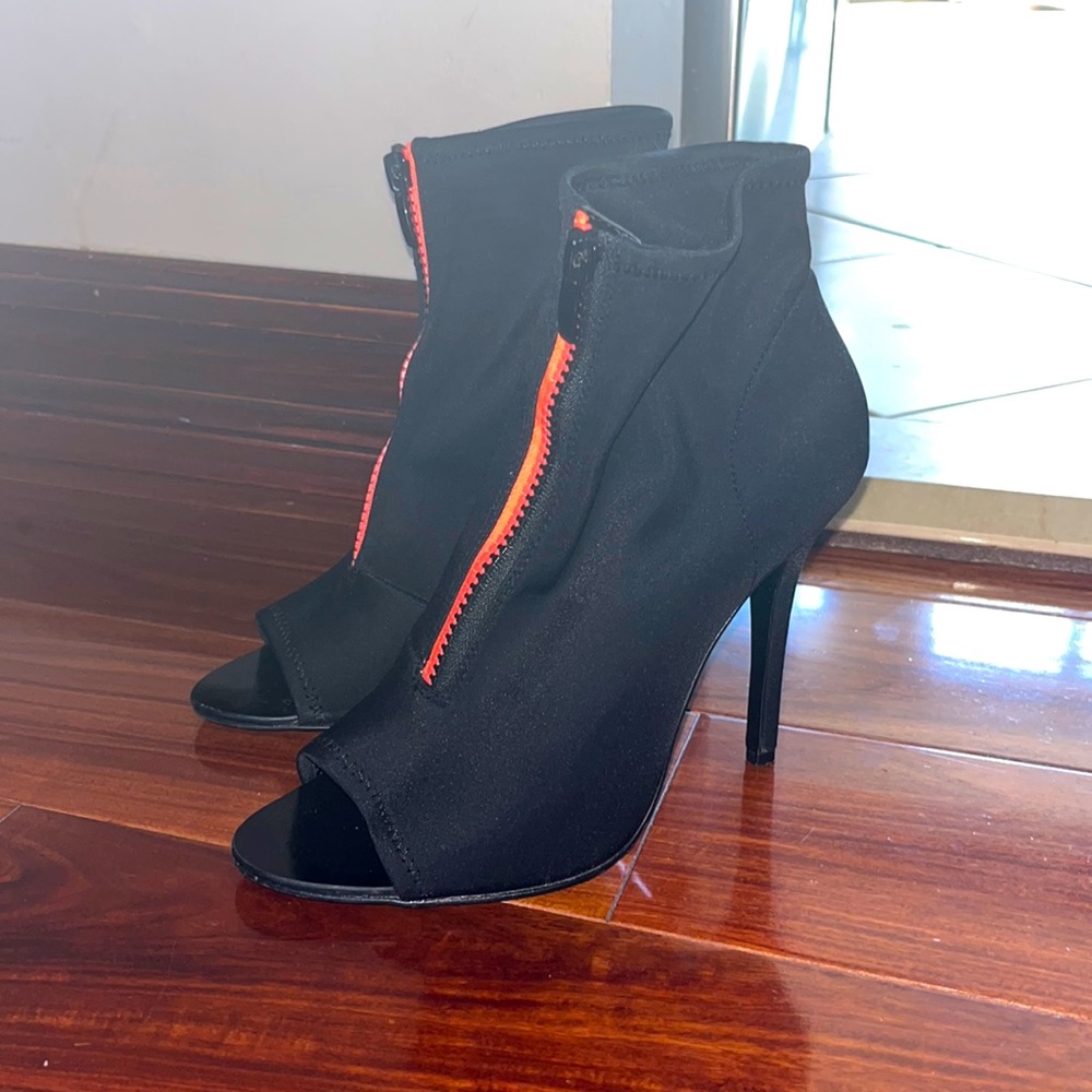 Black open toe heel with hot pink zipper